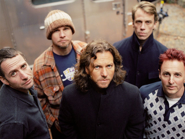Pearl Jam: The drummer is stood at the back, as usual